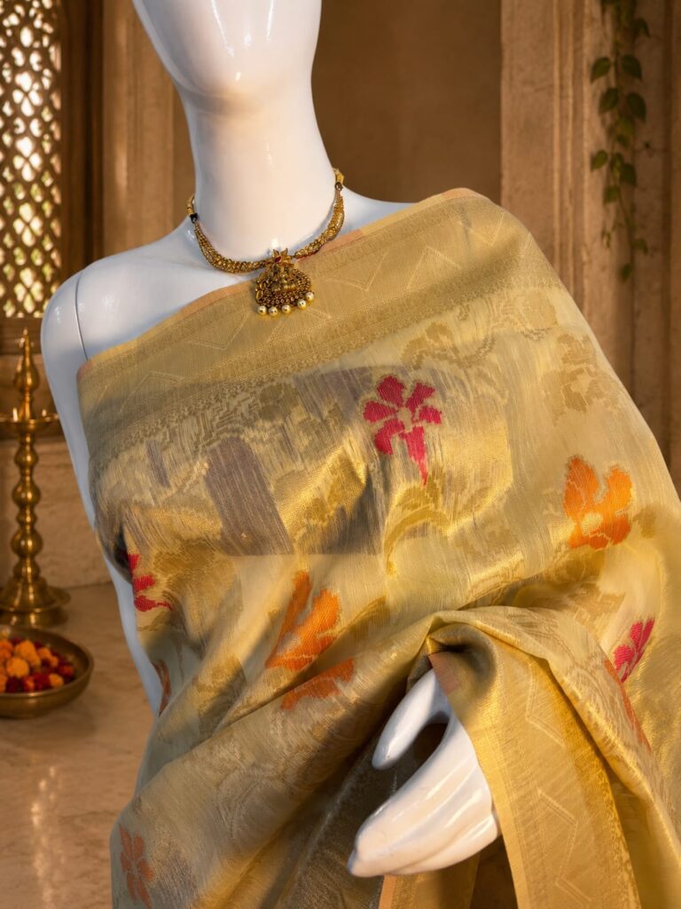 Festive golden saree with traditional weaving
