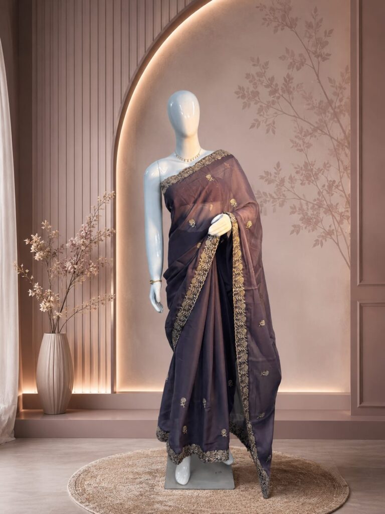 Embroidered georgette saree in plum shade